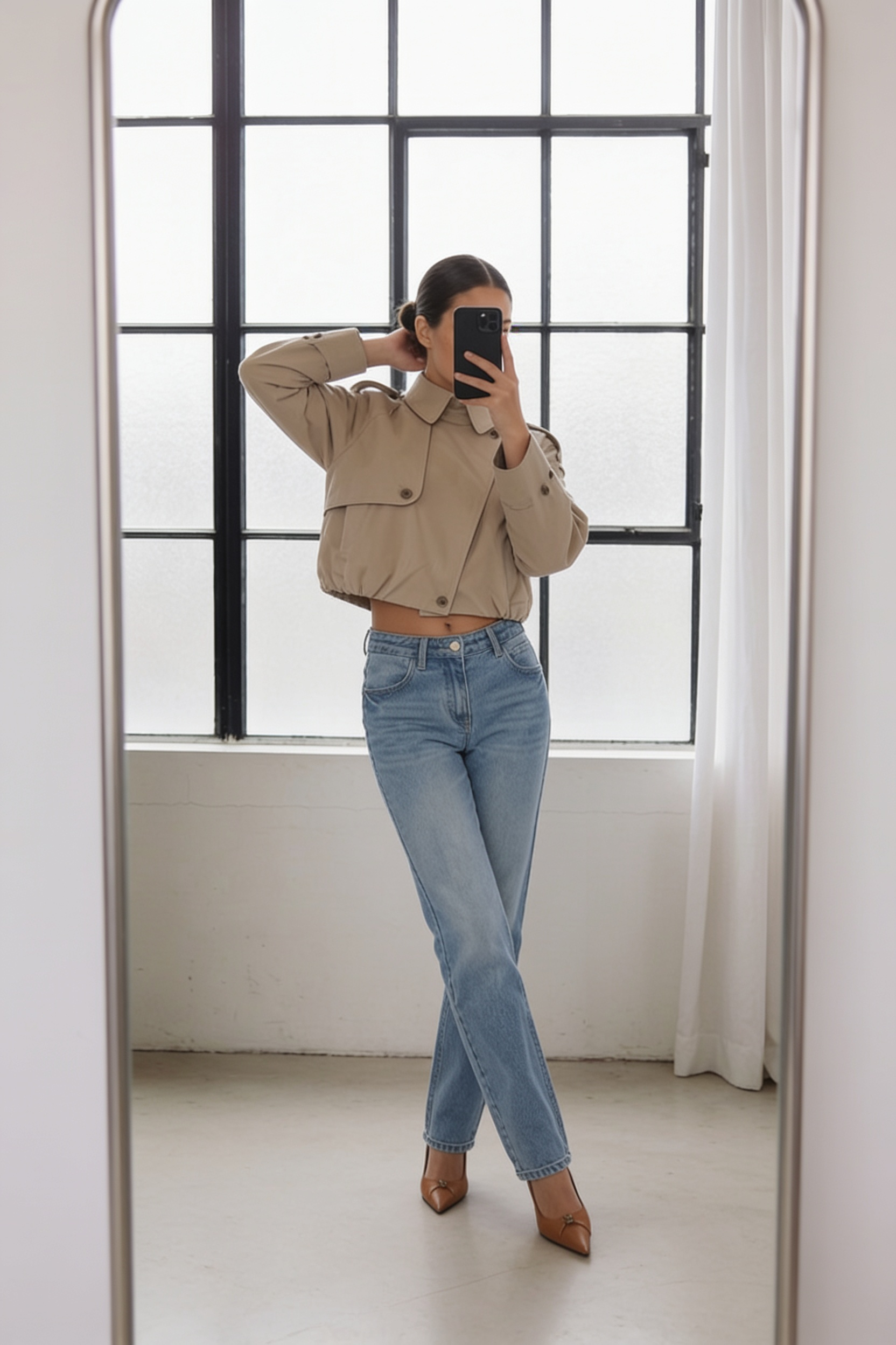 Back view of the Darcy tan cropped trench coat