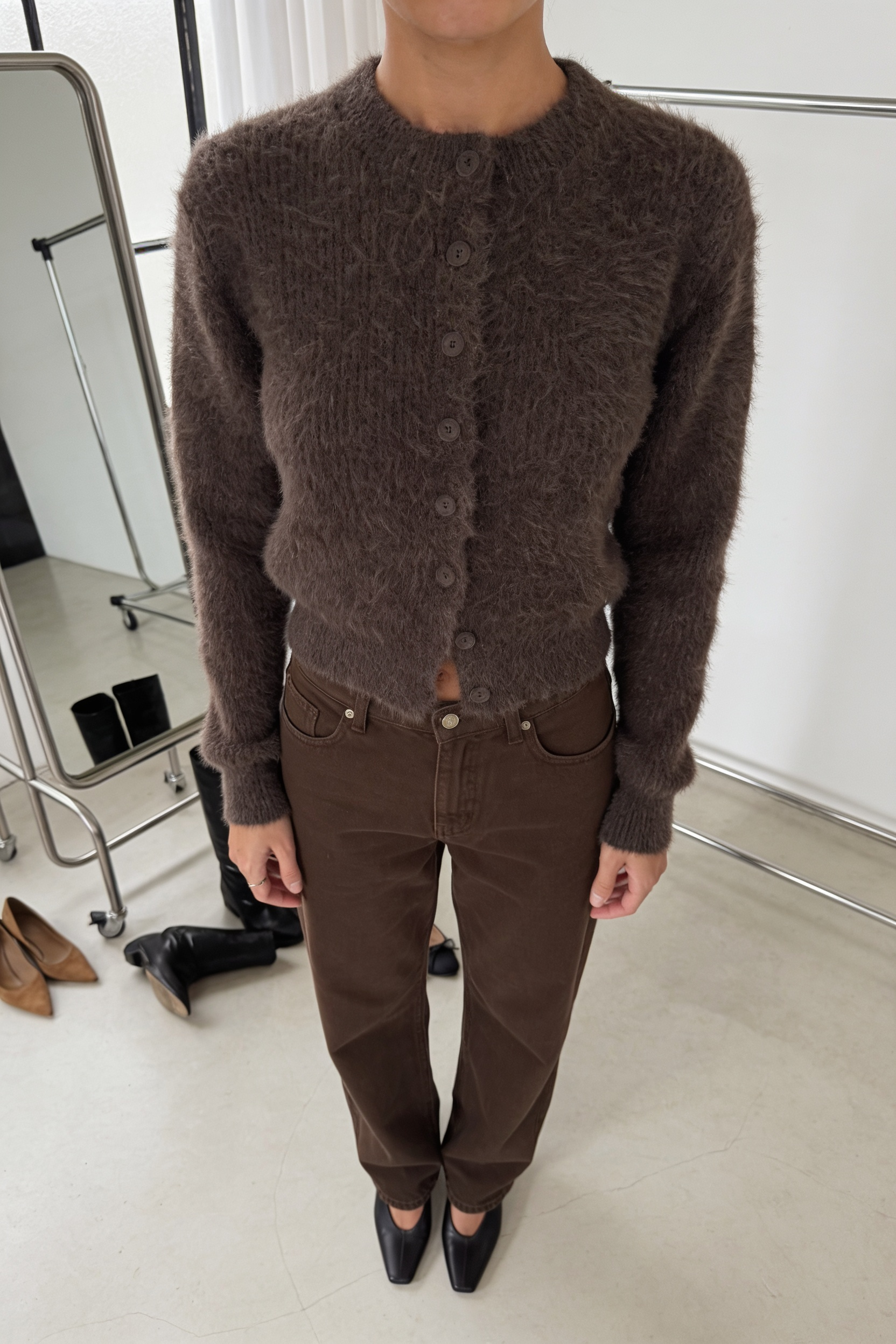 Model styling the Noor brown fluffy cropped cardigan