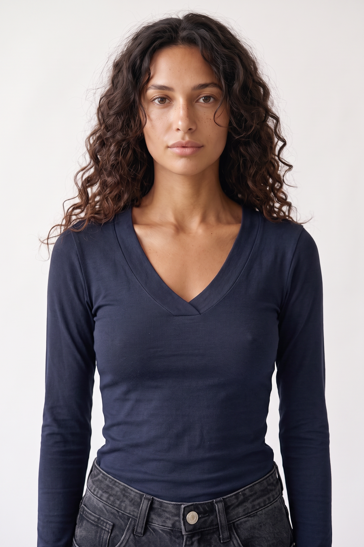 Margaux Deep V Henley Top in navy — model wearing the soft stretch henley with deep V neckline